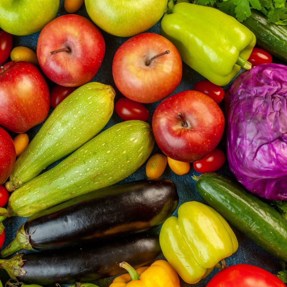 top-view-vegetable-composition-with-fresh-fruits-blue-table